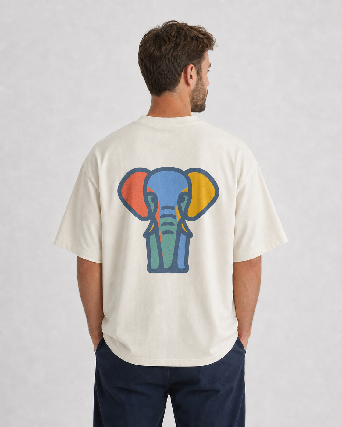 Model wearing the cream Santi Harper Colour Elephant Back Tee, back view